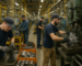 Manufacturing hiring in Michigan's automotive supply corridor with skilled trades workers on a plant floor